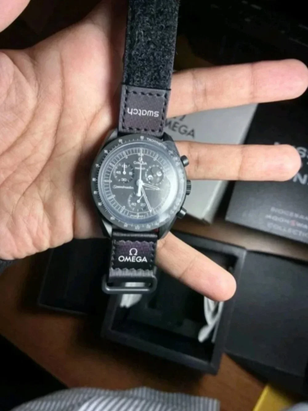Omega x Swatch Speedmaster Mission to the Moon Black Chronograph Watch.